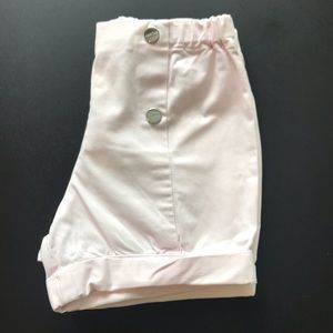 -Powder pink shorts by famous children’s brand Jacadi.